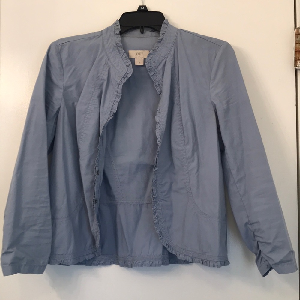 Light blue jacket with ruffles